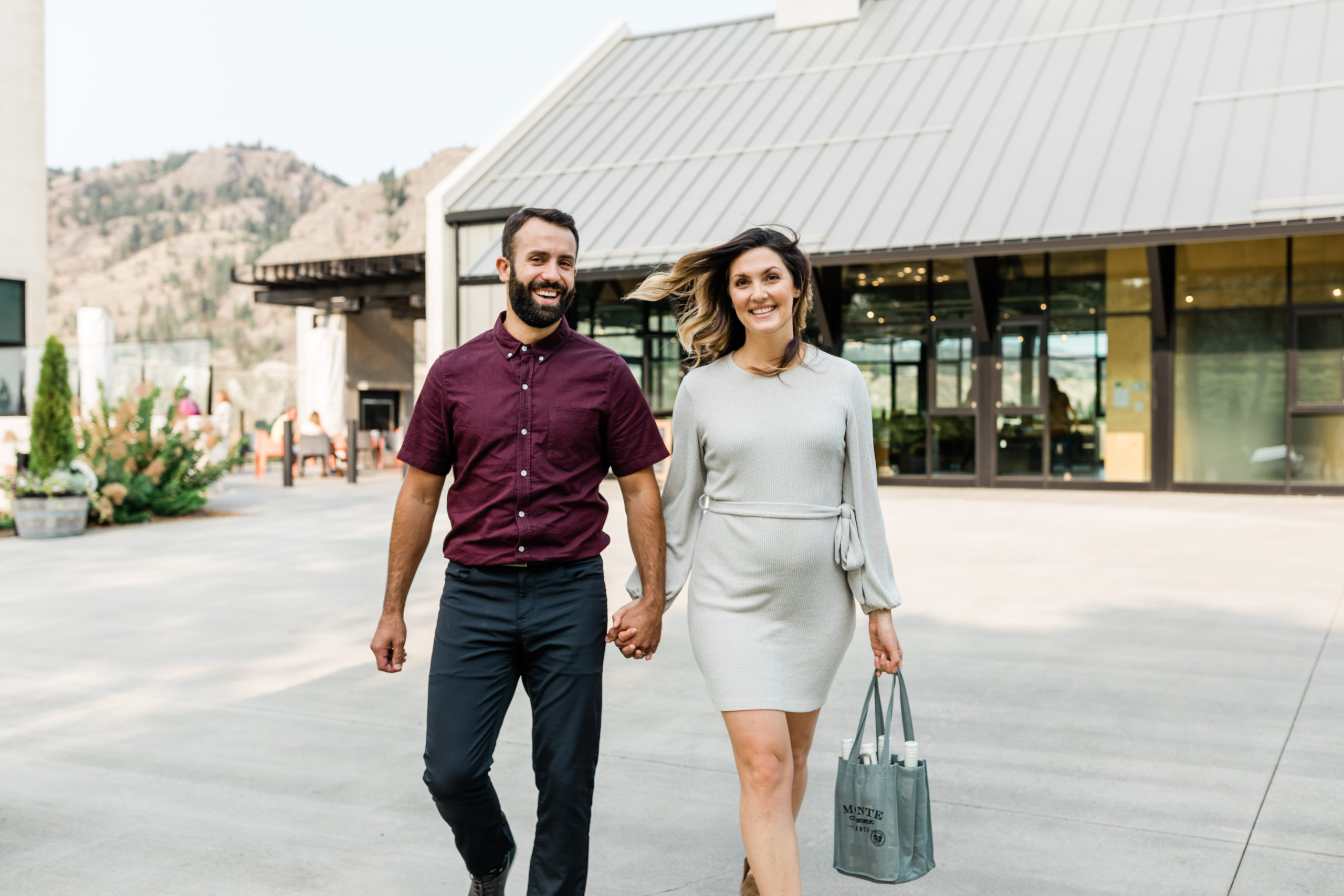 Couple leaving winery with wine